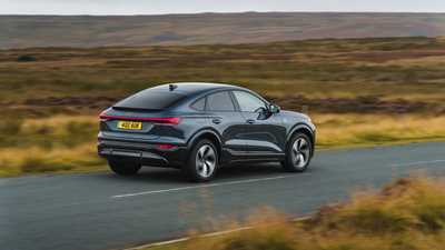 Audi Q6 e-Tron Sportback rear three quarters driving