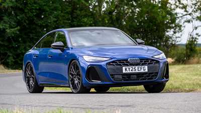 Audi A6 saloon (2025) review: front three quarter cornering, blue paint, low angle