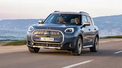 Mini Countryman Electric review - SE ALL4, front, blue, driving