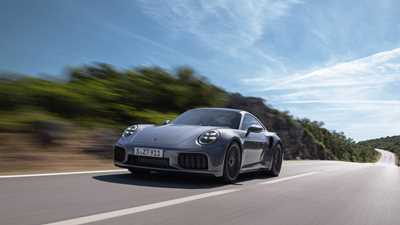 Porsche 911 Turbo S Coupe front three-quarter driving